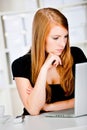 Caucasian Women with Pen and Laptop Royalty Free Stock Photo