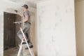 Worker Patching Drywall Royalty Free Stock Photo