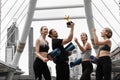 Caucasian yoga team celebration the winning trophy recieve from yoga competition championship Royalty Free Stock Photo