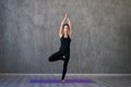 Caucasian young cool attractive yoga woman practicing yoga concept, standing