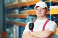 Caucasian young manual worker in warehouse Royalty Free Stock Photo