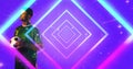 Caucasian young sportsman seen through geometric neon design over blue background, copy space