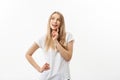 Caucasian young woman with cute adorable playful shy smile. Model white t-shirt isolated on white background Royalty Free Stock Photo