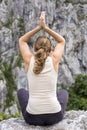 Caucasian young woman doing yoga fitness exercise