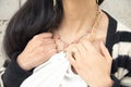 Caucasian young woman wearing necklace Royalty Free Stock Photo