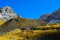 Caucasus Mountains, village Juta. green hill, blue sky, and snowy peak Chaukhebi in summer.