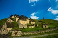 CAUCASUS, NORTH OSSETIA, ALANIA, RUSSIA - JUNE 27, 2015: view of the stone crypts in the mountains, which are called the city of