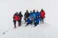 Caucasus / Russia - 07.15.2018 Group of climbers climbing mountain peaks.