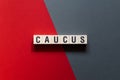 Caucus - word concept on cubes