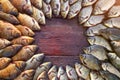 Caught carp fish on wood. Catching freshwater fish on wood background. Round a lot of bream fish, crucian or roach on Royalty Free Stock Photo