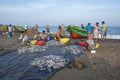 Caught fish sorting on the ocean shore