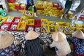 Caught fishes sorting to baskets by Vietnamese women workers in Tac Cau fishing port, Me Kong delta province of Kien Giang, south Royalty Free Stock Photo