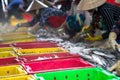 Caught fishes sorting to baskets by Vietnamese women workers in Tac Cau fishing port, Me Kong delta province of Kien Giang, south Royalty Free Stock Photo