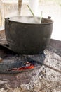 Cauldron On Fire - Traditional Food Preparation