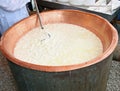 cauldron with sour milk and rennet to make cheese in the dairy Royalty Free Stock Photo
