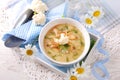 Cauliflower cream soup with chicken and parmesan cheese