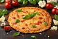 Cauliflower crust pizza with tomato sauce, cheese and basil. Healthy diet food Royalty Free Stock Photo