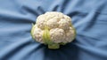 Cauliflower. The lighting highlights the bumpy texture of the Royalty Free Stock Photo