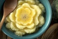 Cauliflower Mashed Potatoes Served in a Blue Bowl With a Wooden Spoon on a Wooden Table Royalty Free Stock Photo