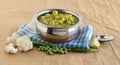 Cauliflower and Peas Curry Healthy Indian Side Dish in a Steel Utensil Royalty Free Stock Photo