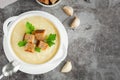 Cauliflower potato soup puree on stone background, Creamy cauliflower soup Royalty Free Stock Photo