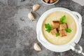 Cauliflower potato soup puree on stone background, Creamy cauliflower soup Royalty Free Stock Photo