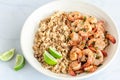 Cauliflower Rice and Sauteed Shrimp in a Bowl on White BackgroundCauliflower Rice and Sauteed Shrimp / Prawn Close Up