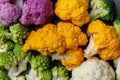 Cauliflower and romanesco broccoli on wooden background. Healthy food concept Royalty Free Stock Photo