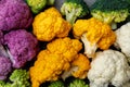 Cauliflower and romanesco broccoli on wooden background. Healthy food concept Royalty Free Stock Photo