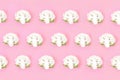 Cauliflower seamless pattern on a pink pastel background.