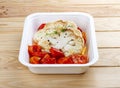 Cauliflower steak. Vegetarian food. Takeaway food. On a wooden background