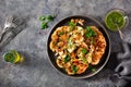 Cauliflower steaks with herb sauce and spice. plant based meat substitute