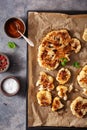 cauliflower steaks with herb and spice on baking tray. plant based meat substitute