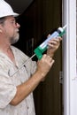 Caulking doors Royalty Free Stock Photo