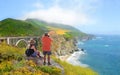 Cauple on hiking trip enjoying beautiful summer mountains, coastal landscape, Royalty Free Stock Photo