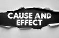 CAUSE AND EFFECT phrase shown under torn paper with rough lettering. Concept of logic, reasoning, science, and relationship Royalty Free Stock Photo