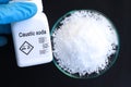 caustic soda in bottle , chemical in the laboratory and industry