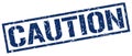 Caution blue grunge square vintage stamp Royalty Free Stock Photo