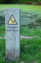 Caution deep water sign. Royalty Free Stock Photo