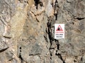 CAUTION FALLING ROCKS sign