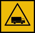Caution, heavy goods vehicles in operation.
