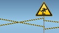 Caution, low-noticeable obstacle. Safety sign. Yellow triangle with black image on the pole and protecting ribbons. Sky