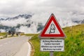 Caution marmots traffic sign on an Alpine road Royalty Free Stock Photo
