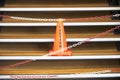 Caution red cone safety notice at workplace office stair Royalty Free Stock Photo