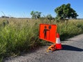 Caution road work traffic sign on a rural road Royalty Free Stock Photo