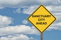 Caution Sign Blue Sky - Sanctuary City Ahead Royalty Free Stock Photo