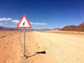 Caution sign near a road in Namibia