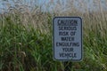 Caution Sign of Risk of Water Engulfing Your Vehicle