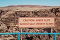 Caution sign, sheer cliff