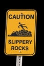 Caution Sign for Slippery Rocks Royalty Free Stock Photo
